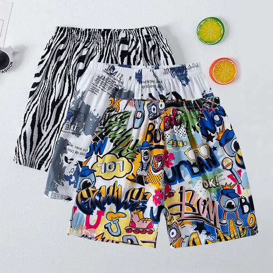 Summer children's color printing thin beach shorts boys and girls casual and comfortable pants elastic waist cute shorts.