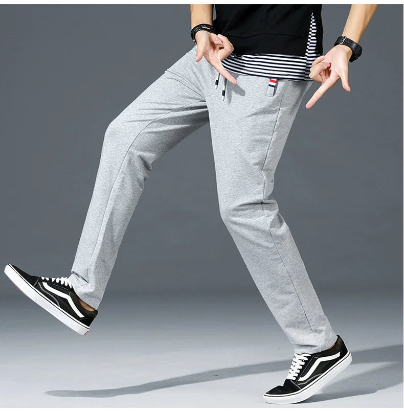 Autumn Pants Men Fitness Sportswear Tracksuit Elastic Waist Sweatpants Cotton Trousers Loose Gyms Jogger Track Pants Mens M- 8XL